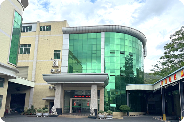 Modern glass-fronted paper facility headquarters building