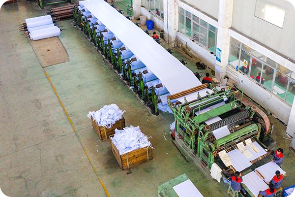 Aerial view of paper manufacturing line with machinery