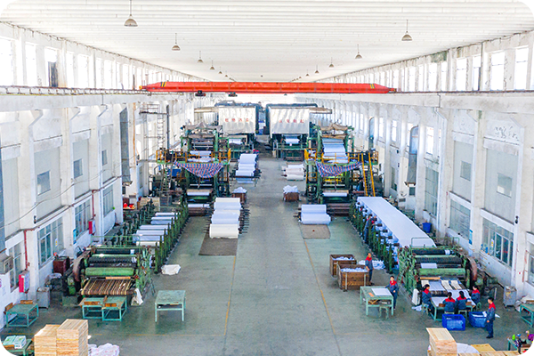 Modern paper production workshop interior with equipment lines