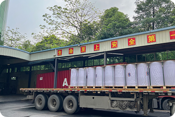 Loaded delivery truck with paper products ready for shipping